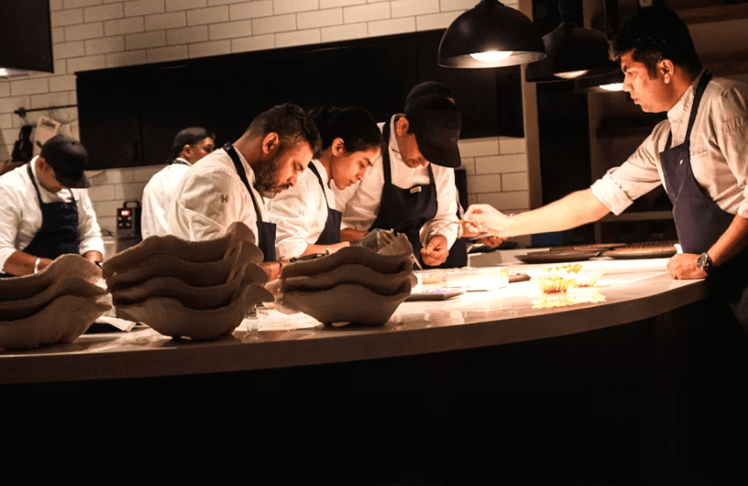 Chef team briefing in the kitchen